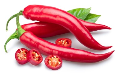 Red,Hot,Chilli,Peppers,,Chili,Slices,And,Green,Leaves,Isolated