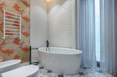A,Well-designed,Bathroom,Showcases,A,White,Freestanding,Bathtub,Complemented,By