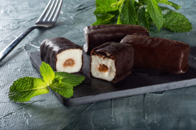 Glazed,Cheese,With,Condensed,Milk,On,A,Board,With,Mint.