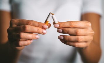 Woman,Brakes,Cigarette,In,Hands.,Woman,Refusing,Tobacco.,Stop,Smoking,