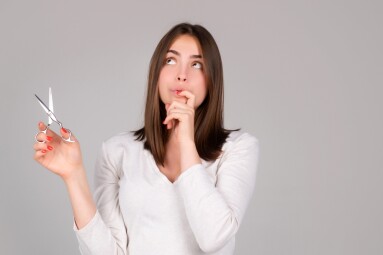 Woman,With,Scissors,Having,Hair,Cut.,Amazed,Girl,With,Straight