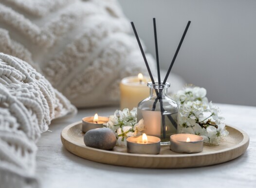 Home,Comfort,,Coziness,,Aromatherapy.,Cozy,Interior,With,Knitting,,Burning,Candles