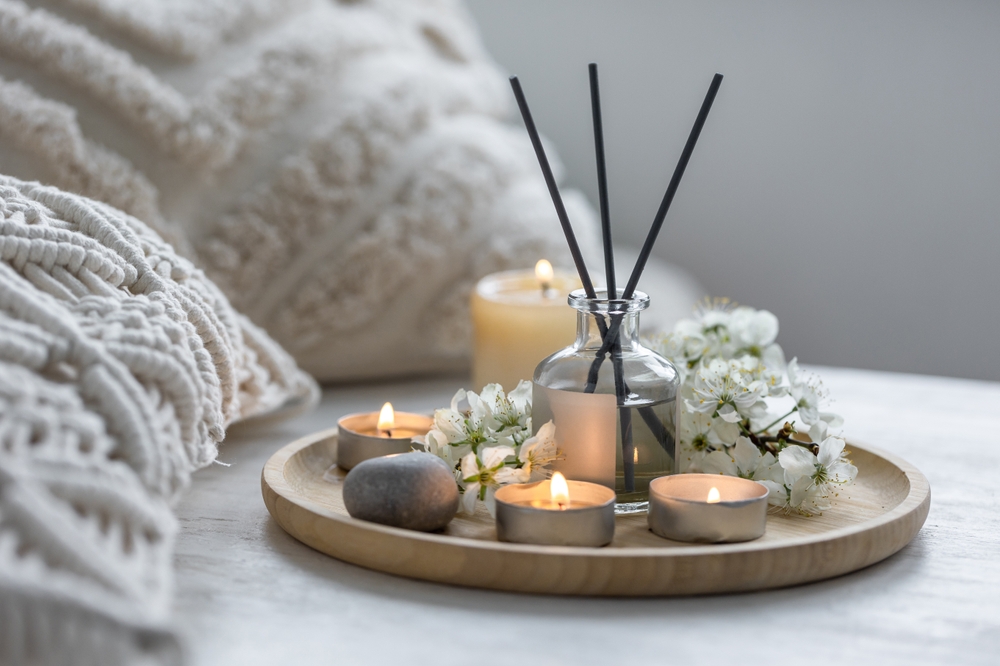 Home,Comfort,,Coziness,,Aromatherapy.,Cozy,Interior,With,Knitting,,Burning,Candles