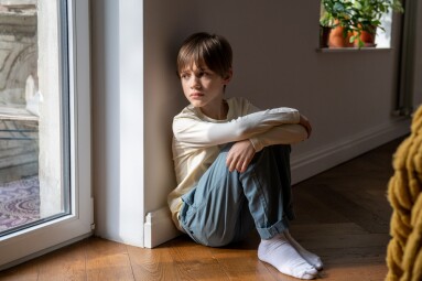 Kid,Psychological,Trauma.,Lonely,Child,Boy,Sadly,Look,To,Window
