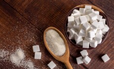 White,Sugar,Cubes,In,Wooden,Bowl.