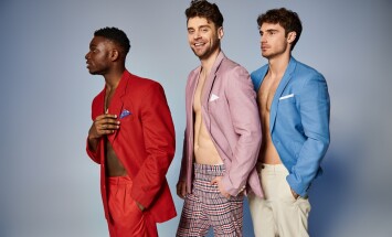 Cheerful,Appealing,Diverse,Men,In,Stylish,Vibrant,Suits,Posing,In