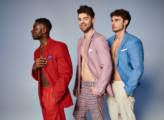 Cheerful,Appealing,Diverse,Men,In,Stylish,Vibrant,Suits,Posing,In