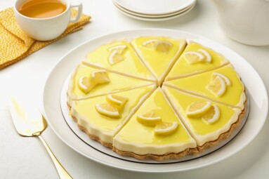 Delicious,Lemon,Cheesecake,Served,On,White,Table,,Closeup