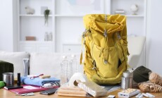 Survival,Kit.,Different,Emergency,Supplies,On,Wooden,Table,Indoors