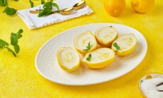 Dessert,,Lemon,Posset,Or,Citrus,Mousse,In,Lemon,Peel,Halves
