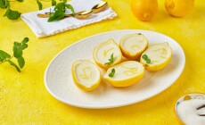 Dessert,,Lemon,Posset,Or,Citrus,Mousse,In,Lemon,Peel,Halves