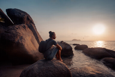 Young,Man,Traveller,With,Backpack,Watching,Sunset