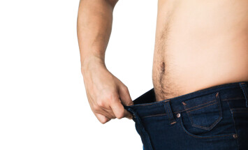 Close,Up,Man,In,Blue,Jeans,Try,To,Loss,Weight