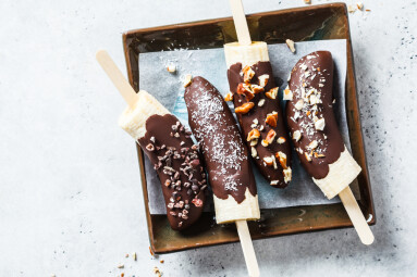 Vegan,Dessert,For,Kids.,Banana,In,Chocolate,With,Nuts,,Top