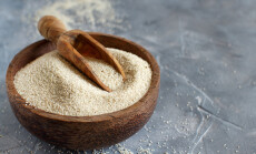 Raw,Fonio,Seeds,In,A,Bowl,With,A,Spoon,On