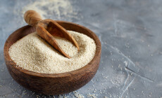Raw,Fonio,Seeds,In,A,Bowl,With,A,Spoon,On