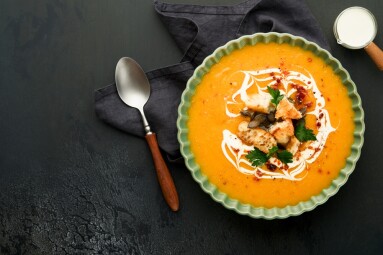 Pumpkin,And,Carrot,Cream,Soup,With,Herbs,,Seasonings,And,Seeds