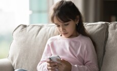 Screen,Time.,Portrait,Little,Girl,Of,Early,School,Age,Rest
