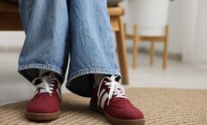 Woman,Wearing,Stylish,Sneakers,At,Home,,Closeup