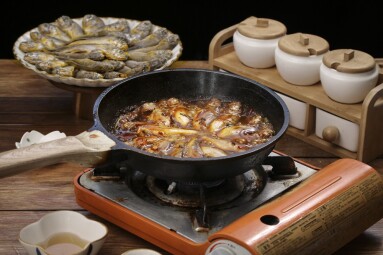 Braised,Wild,Fish,With,Plum,Sauce,Cooking,In,A,Wok
