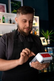 medium-shot-plus-size-man-working-as-barista