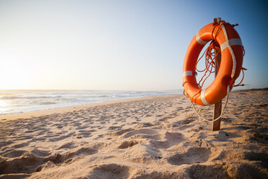 Orange,Buoy,On,A,Beach