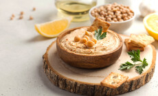 Hummus,In,A,Wooden,Plate,,Chickpeas,,Croutons.,Dishes,Of,Chickpeas,