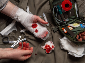 Bandaging,Process.,First,Aid,Kit,And,Items,For,Stopping,Bleeding