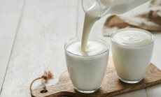 Pouring,Homemade,Kefir,,Buttermilk,Or,Yogurt,With,Probiotics.,Yogurt,Flowing