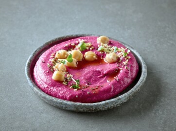 Plate,Of,Beetroot,Hummus,On,Grey,Kitchen,Table
