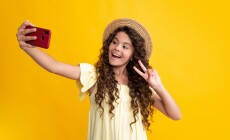 Kids,Selfie.,Cute,Teen,Child,Girl,Paying,With,Phone,,Texting