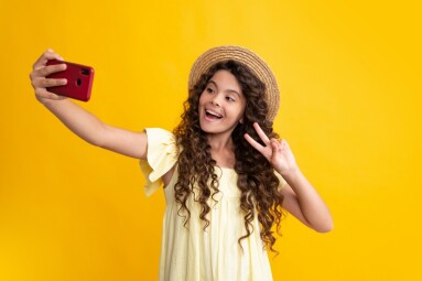 Kids,Selfie.,Cute,Teen,Child,Girl,Paying,With,Phone,,Texting