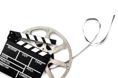 Film,Reels,And,Clapperboard,-,Cinema,And,Filmmaker,Concept.