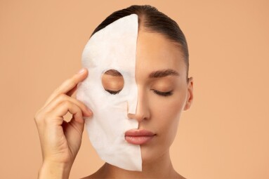 Beauty,Routines.,Closeup,Of,Young,Lady,Removing,Textile,Sheet,Mask