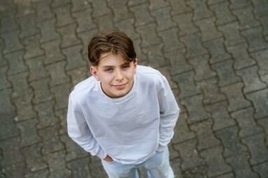 Portrait,Of,Smiling,Teenage,Schoolboy,Looking,At,Camera.,Happy,Teenage