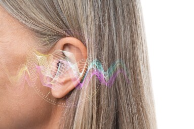 Senior,Woman,And,Sound,Waves,Near,Her,Ear,On,White