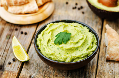 Avocado,Hummus,On,A,Dark,Wood,Background.,Toning.,Selective,Focus