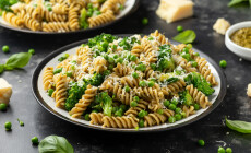 Green,Peas,,Broccoli,Pasta,With,Pesto,Sauce,And,Parmesan,Cheese.
