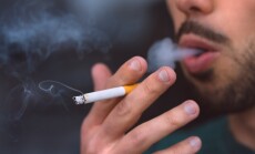 Closeup,Of,Young,Man,Smoking,Cigarette.,Smoking,Addiction,And,Bad
