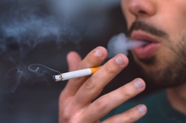 Closeup,Of,Young,Man,Smoking,Cigarette.,Smoking,Addiction,And,Bad