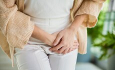 Healthcare,Concept,Image,,Asian,Woman,Holding,Her,Pee,,Health,Care
