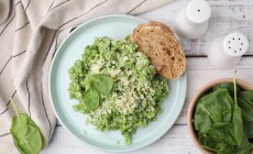Tasty,Spinach,Risotto,Served,With,Bread,On,White,Wooden,Table,