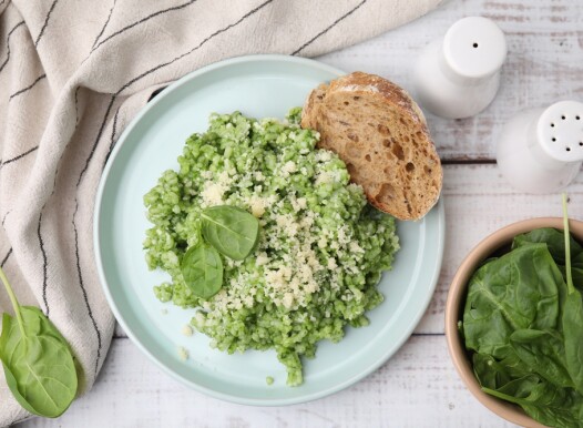 Tasty,Spinach,Risotto,Served,With,Bread,On,White,Wooden,Table,