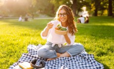 Woman,Enjoying,A,Poke,Bowl,On,A,Sunny,Day,In