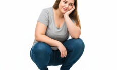 Woman,Looking,At,The,Scale,,Overweight,,Satisfied,With,Weight,Loss