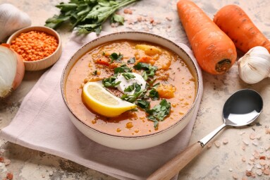 Bowl,Of,Tasty,Lentil,Soup,And,Ingredients,On,Beige,Grunge