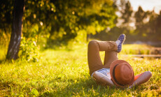 Trendy,Hipster,Girl,Relaxing,On,The,Grass