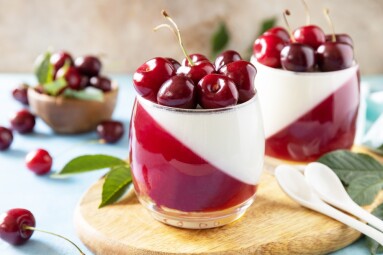 Panna,Cotta,With,Sweet,Cherry,Jelly,On,A,Stone,Tabletop,