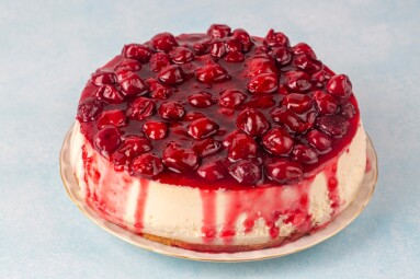 Cheesecake,With,Sour,Cherry,Sauce