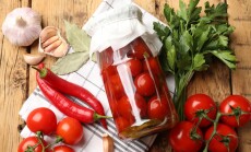 Tasty,Pickled,Tomatoes,In,Jar,And,Ingredients,On,Wooden,Table,
